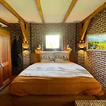 De Bommelerhoeve & Vakantiewoning Apartment